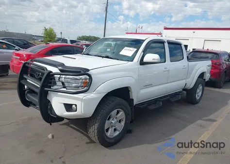 2015 Toyota Tacoma Base V6 z USA, uszkodzony, nr VIN 3TMMU4FN0FM083581